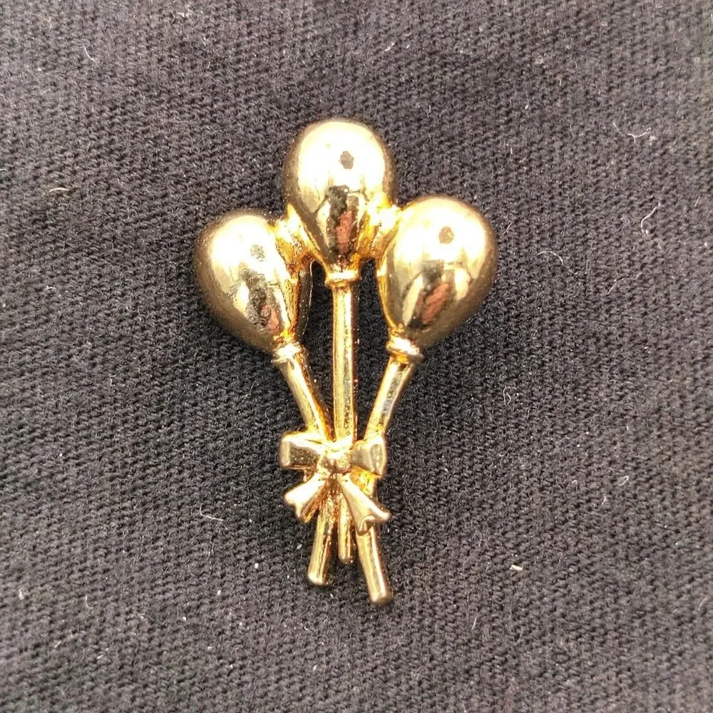 None brooch pin